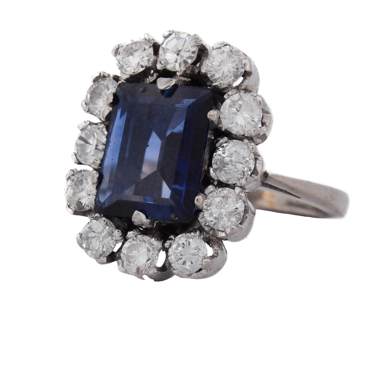 Bague Entourage en or blanc, saphir et diamants