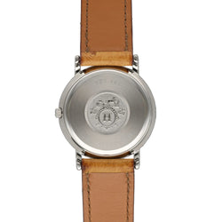 Montre HERMÈS "Sellier" en or jaune et acier