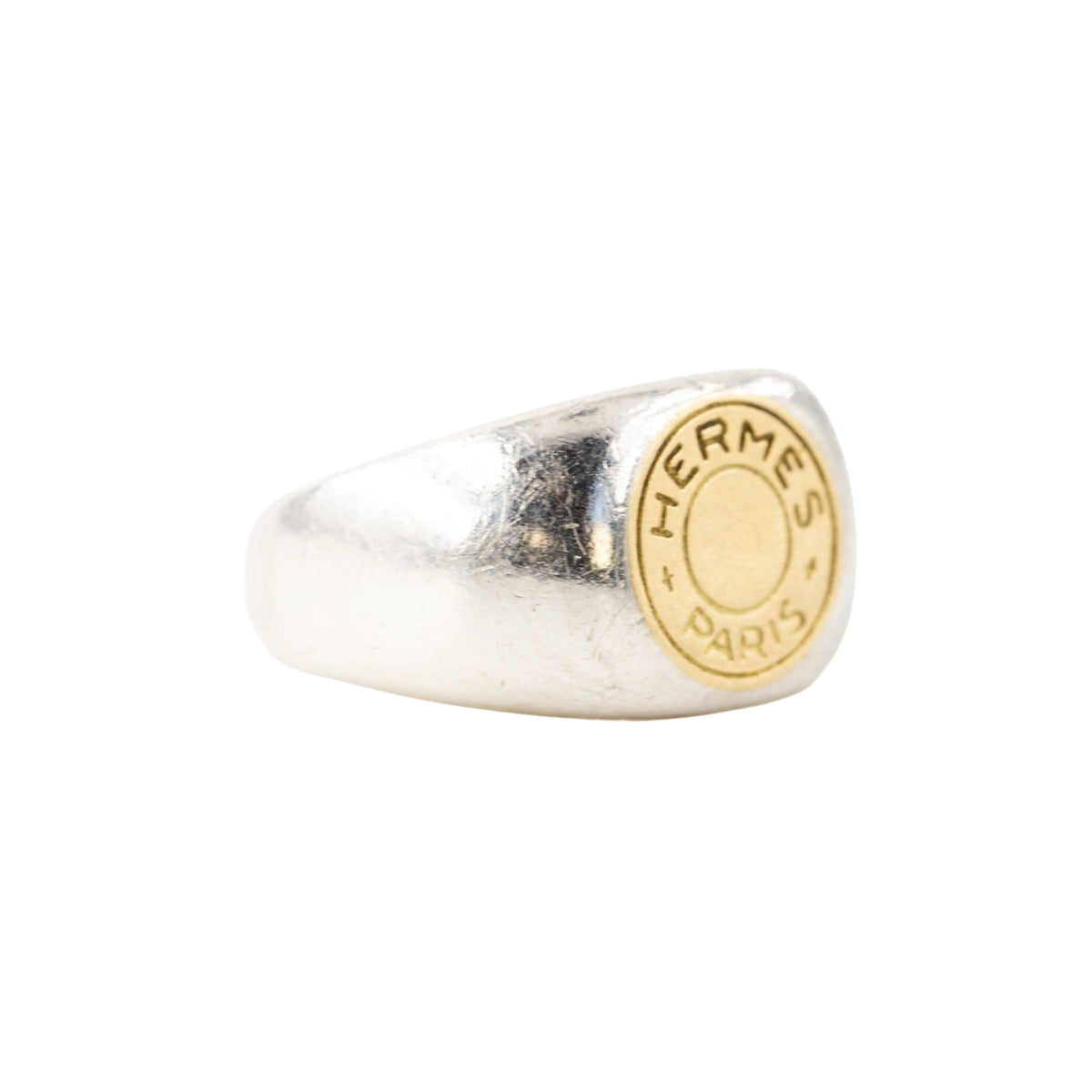 Bague Chevalière HERMÈS "Clou de selle" en argent et or jaune