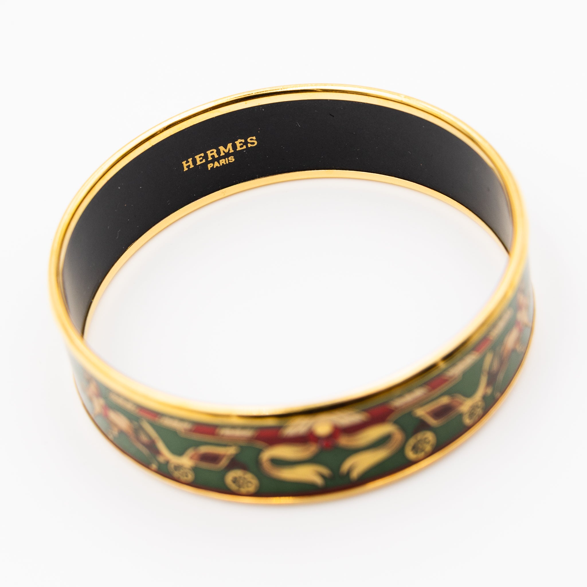 Bracelet et Clips d'oreille HERMÈS en métal doré et émail