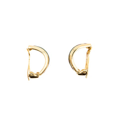 Bracelet et Clips d'oreille HERMÈS en métal doré et émail