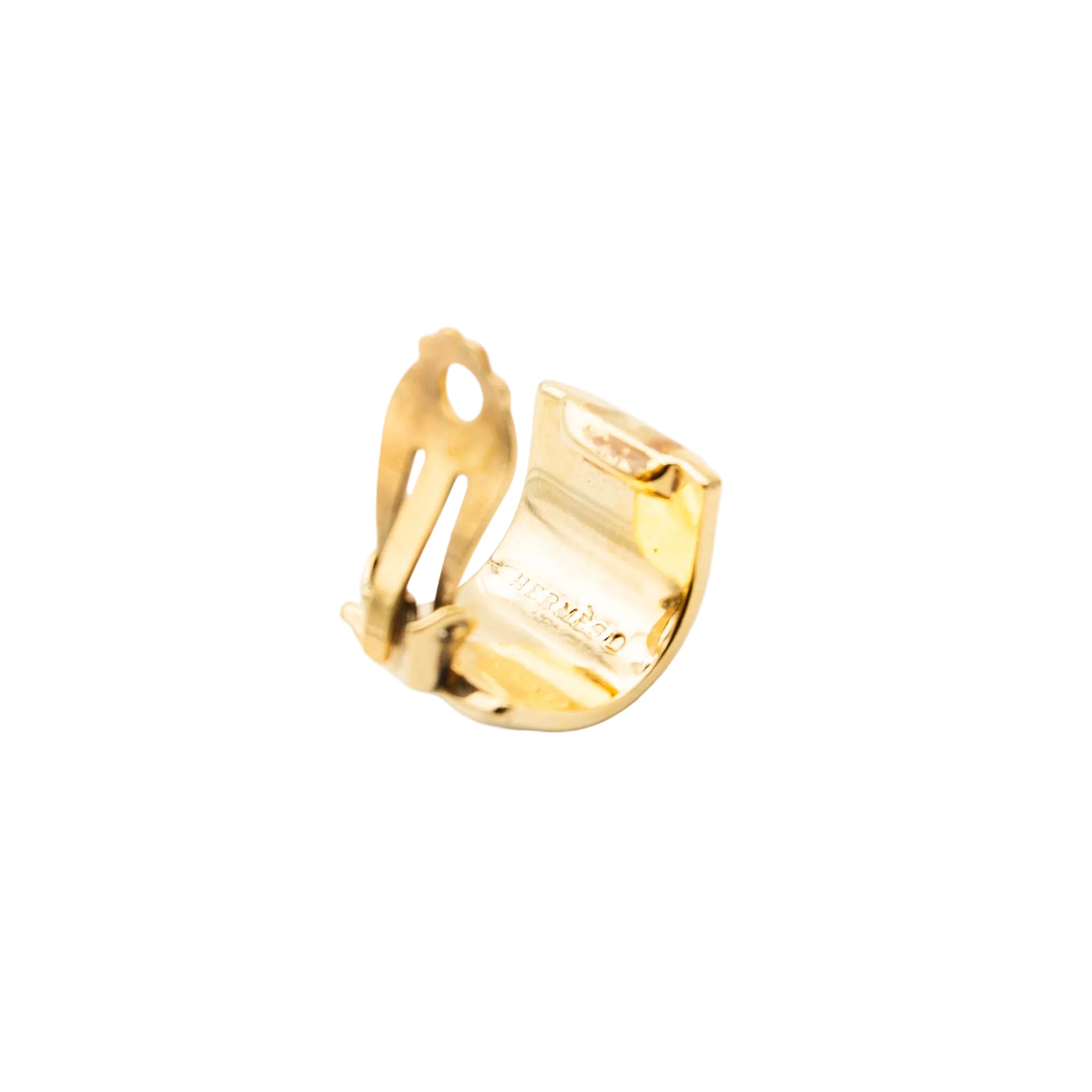 Bracelet et Clips d'oreille HERMÈS en métal doré et émail