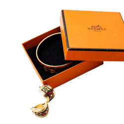 Bracelet et Clips d'oreille HERMÈS en métal doré et émail