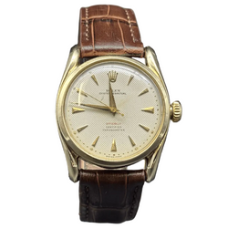 Montre ROLEX "Oyster Perpetual 34" en or jaune et cuir
