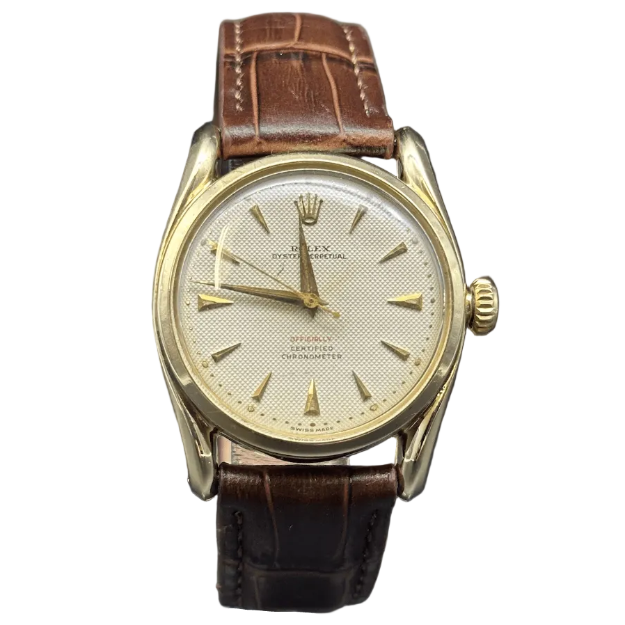 Montre ROLEX "Oyster Perpetual 34" en or jaune et cuir