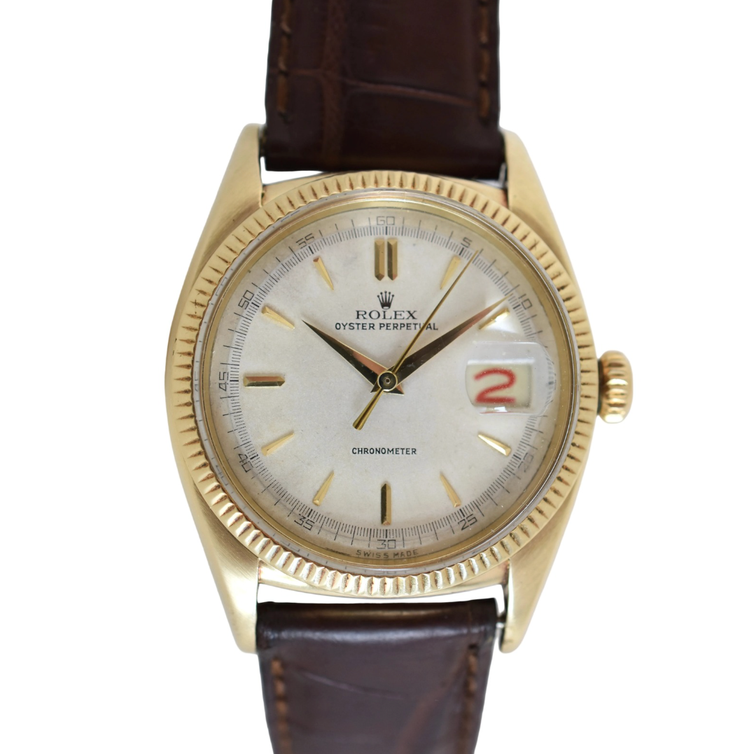Montre ROLEX "Oyster Perpetual Date Ovettone" en or jaune et cuir