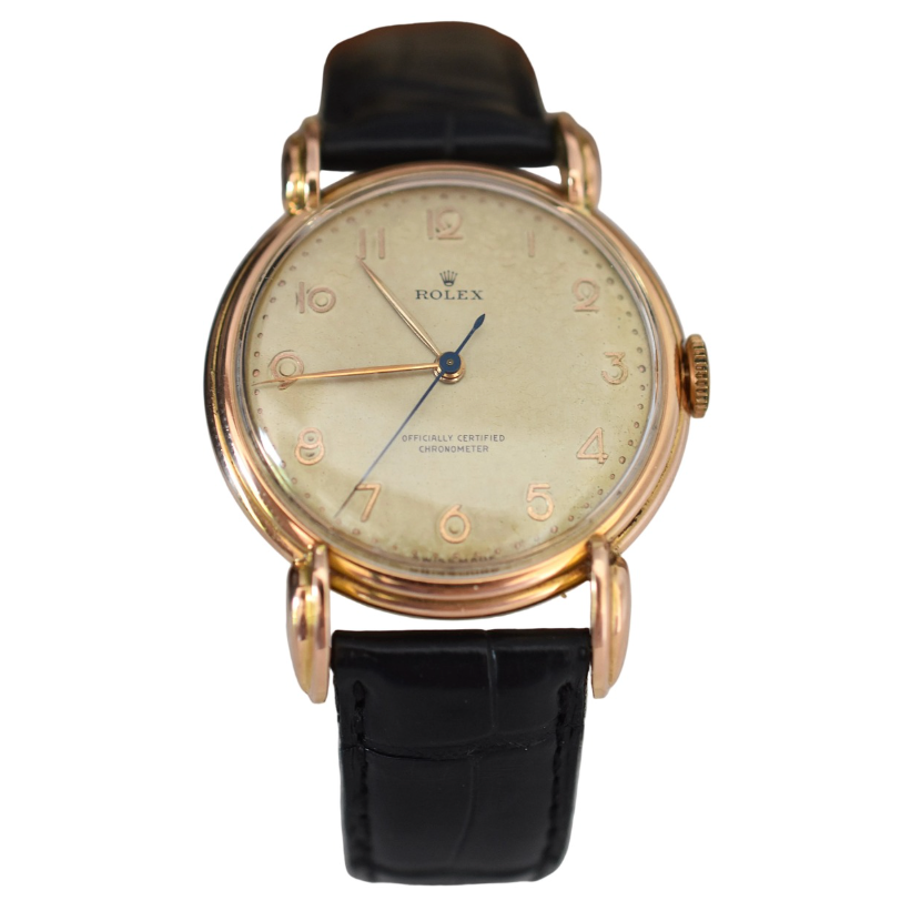 Montre ROLEX "Chronomètre" en or rose, acier et cuir