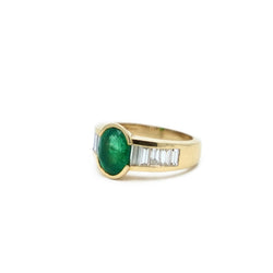 Bague émeraude serti demi-clos