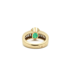Bague émeraude serti demi-clos