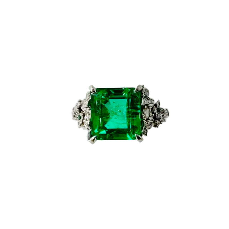 Bague Solitaire en or blanc, émeraude et diamants