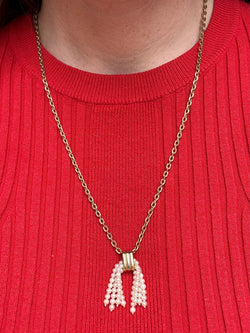 Pendentif pompon de perles de Cartier