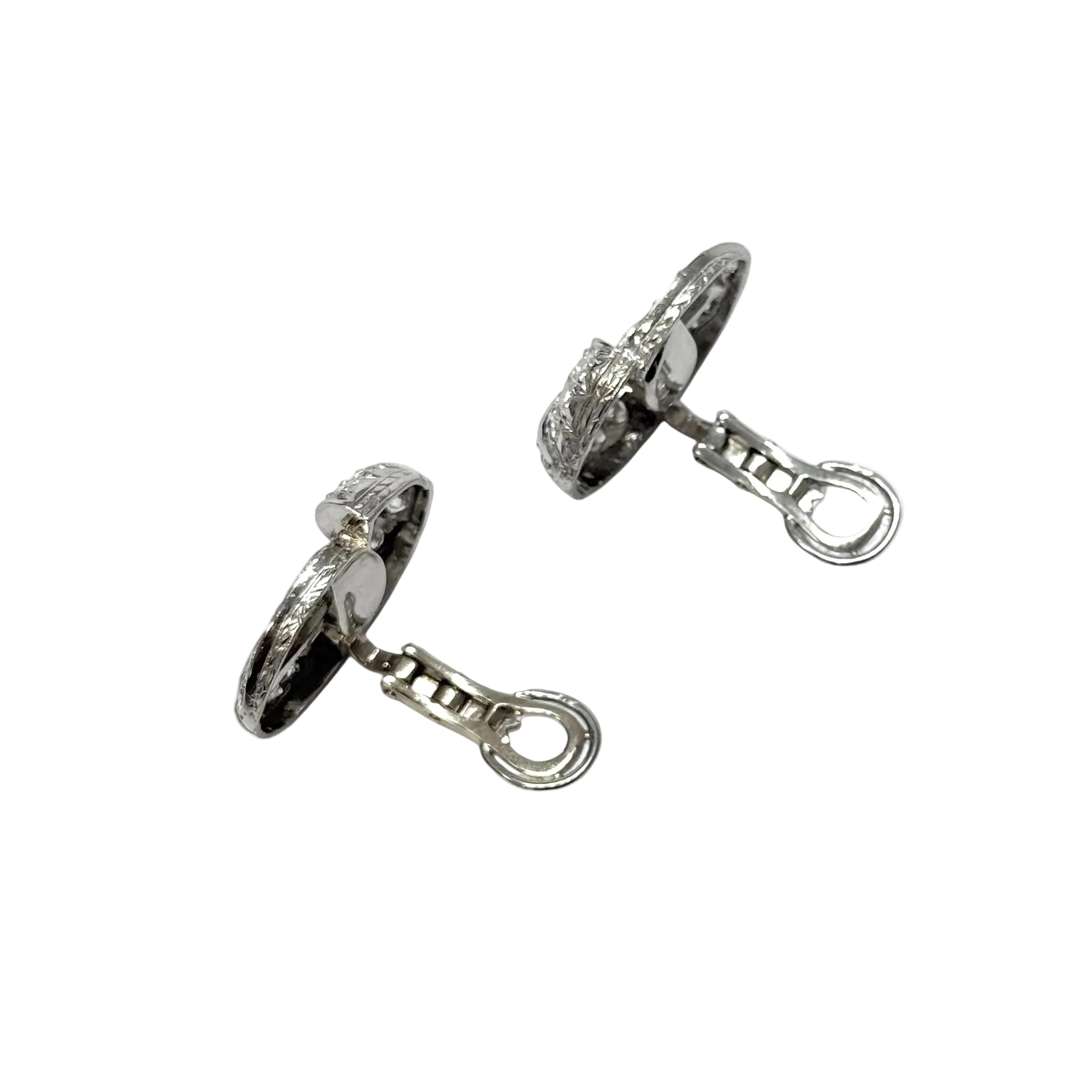 Clips d'oreilles platine et diamants