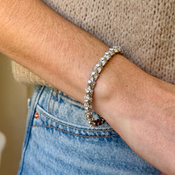 Bracelet articulé or gris et diamants