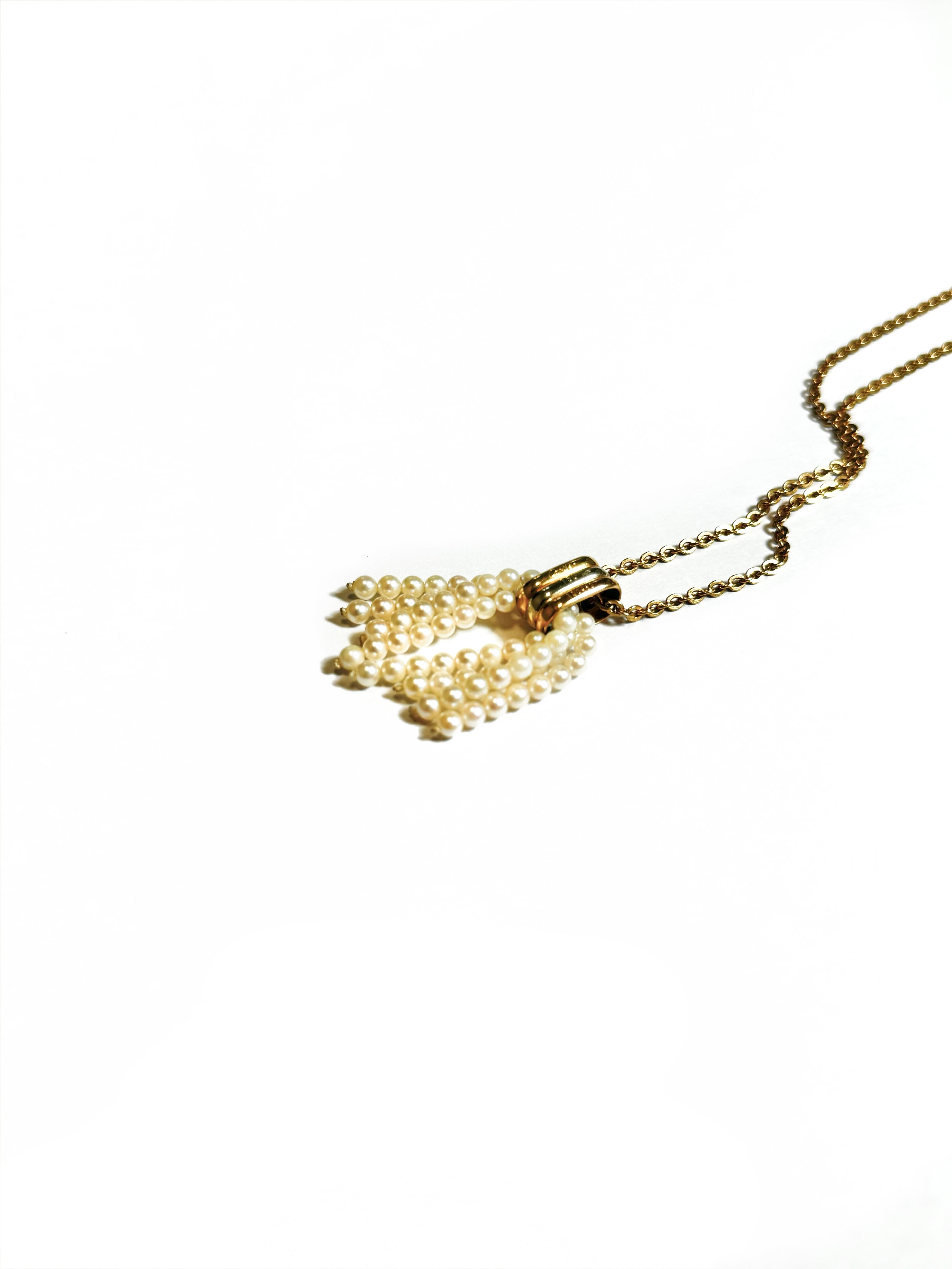 Pendentif pompon de perles de Cartier