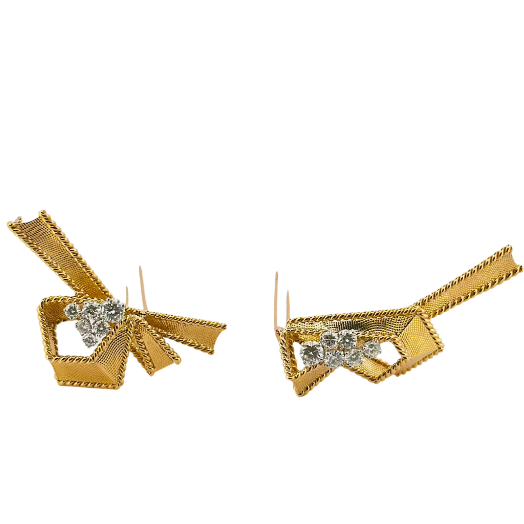 Broches Clips MAUBOUSSIN en or jaune et diamants