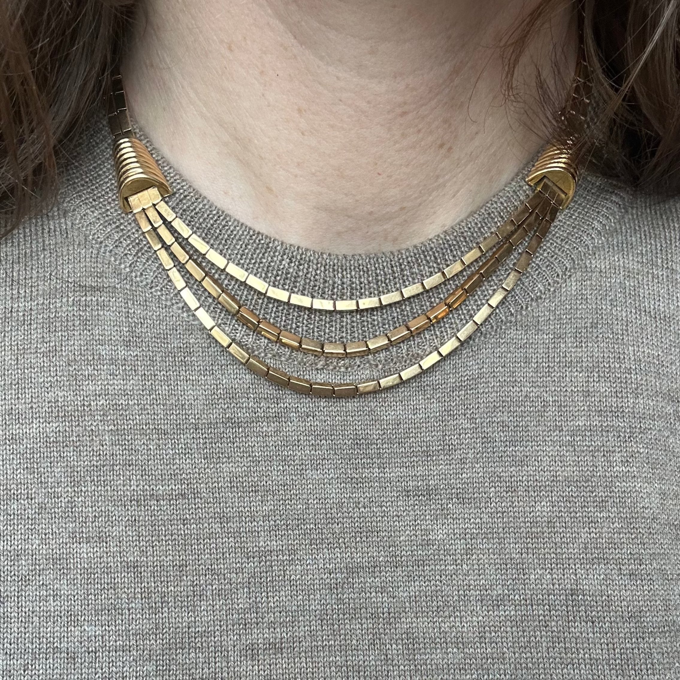Collier or trois rangs articulé