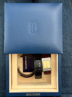 Montre BOUCHERON "Reflet" en or jaune et acier