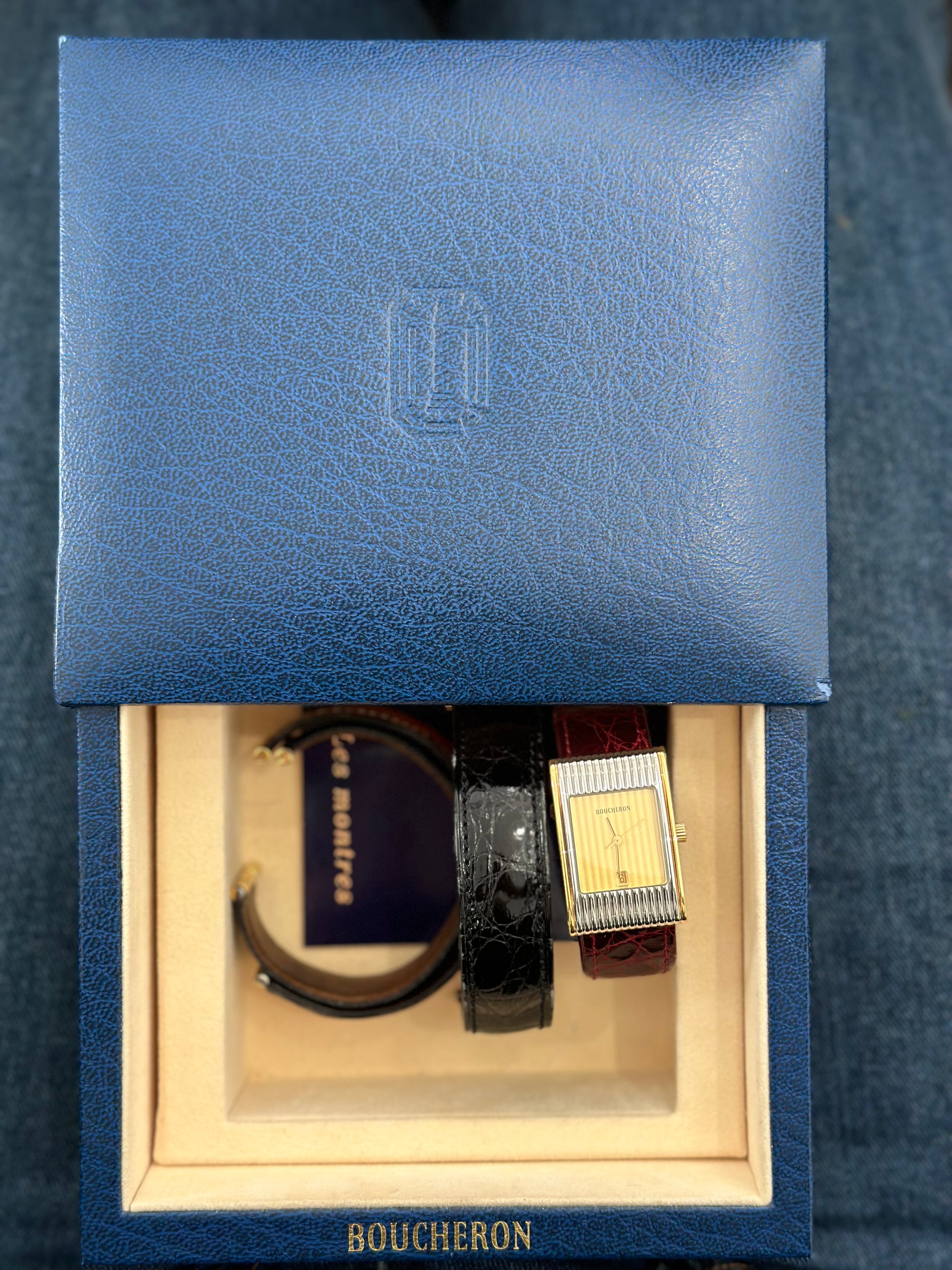 Montre BOUCHERON "Reflet" en or jaune et acier