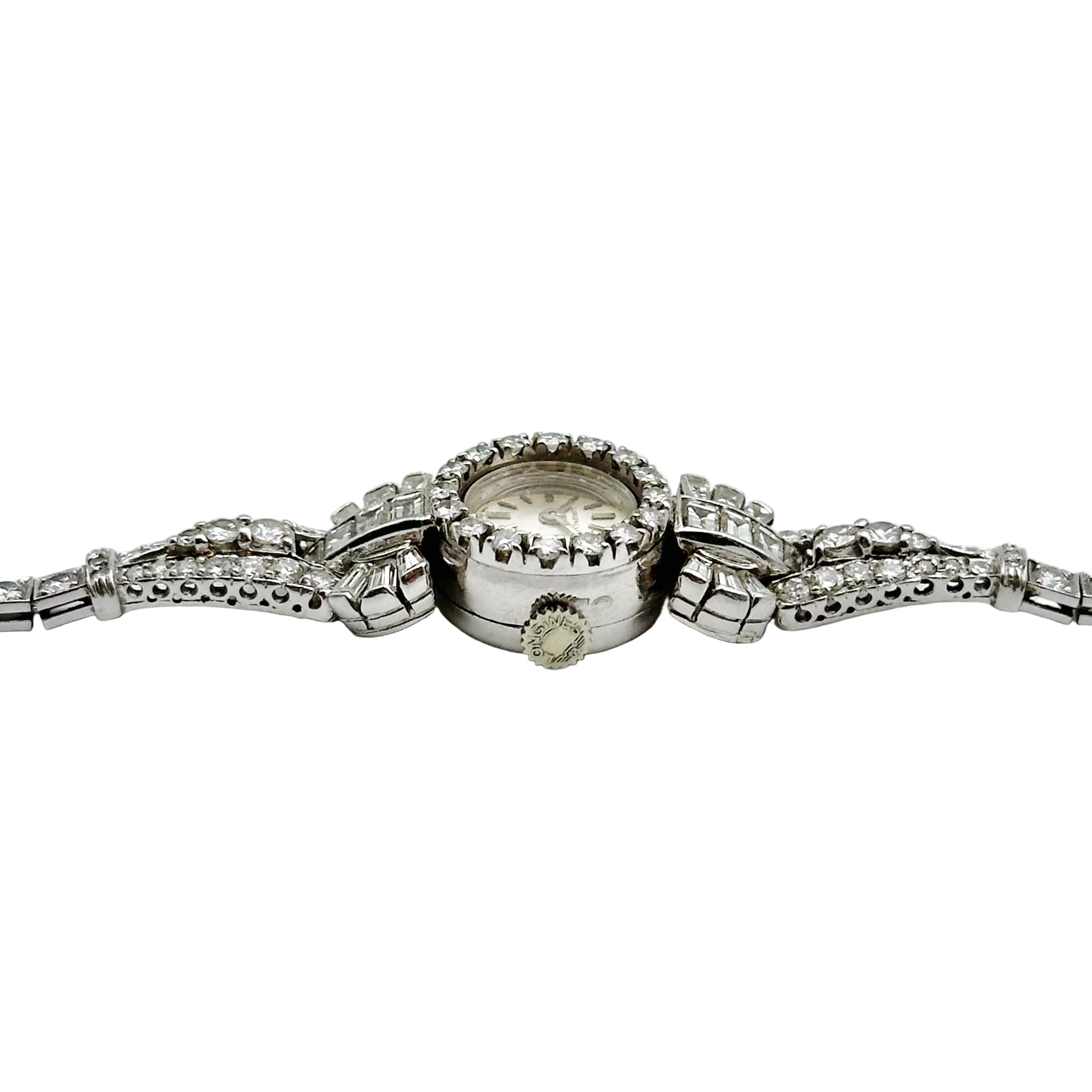 Montre Art déco LONGINES en platine, or blanc et diamants