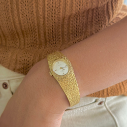 Montre de dame OMEGA en or jaune