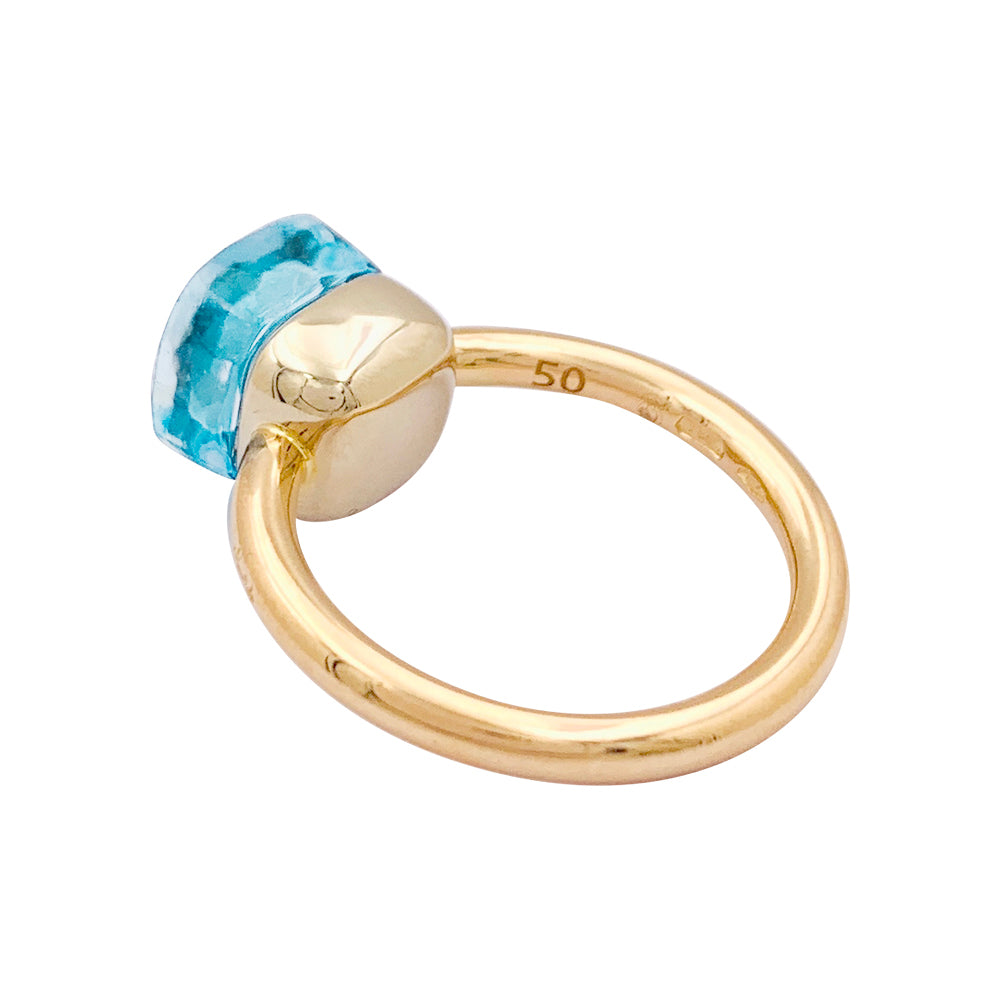 Bague Pomellato, "Nudo Petit", or rose, or blanc, topaze bleue.