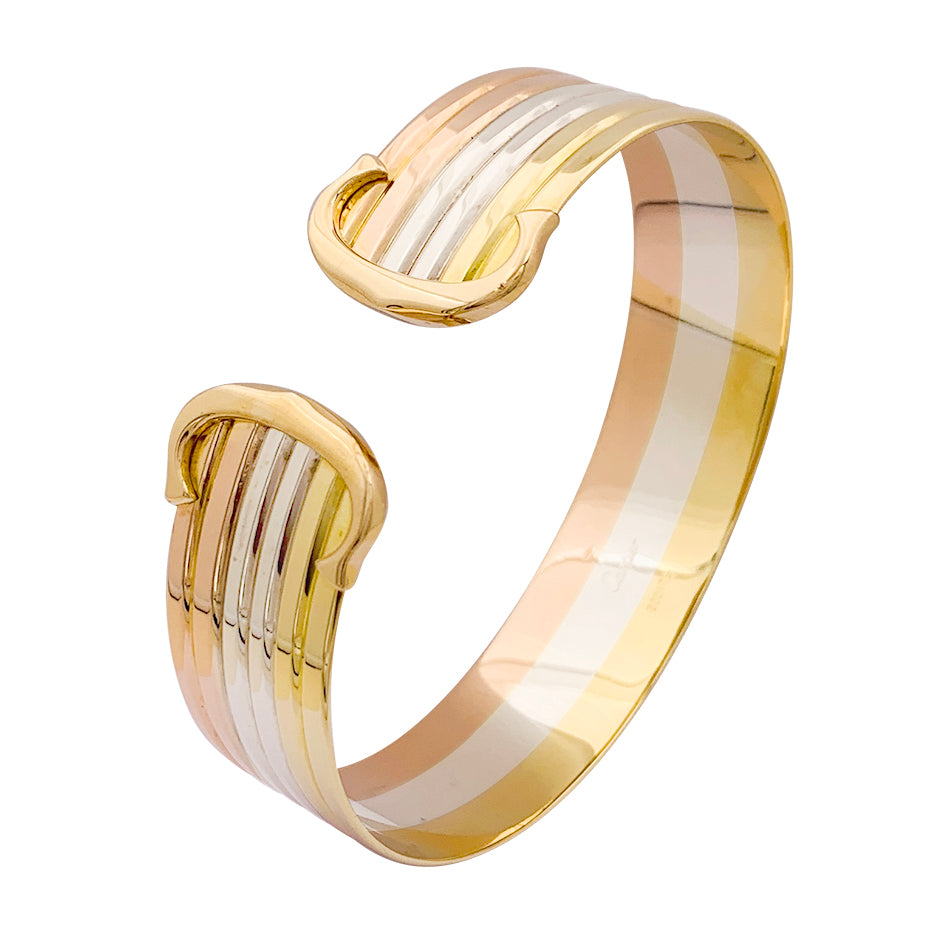 Bracelet Cartier "Double C" trois ors.