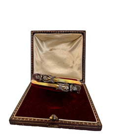 Double bangle bracelet in yellow gold, garnets and diamonds