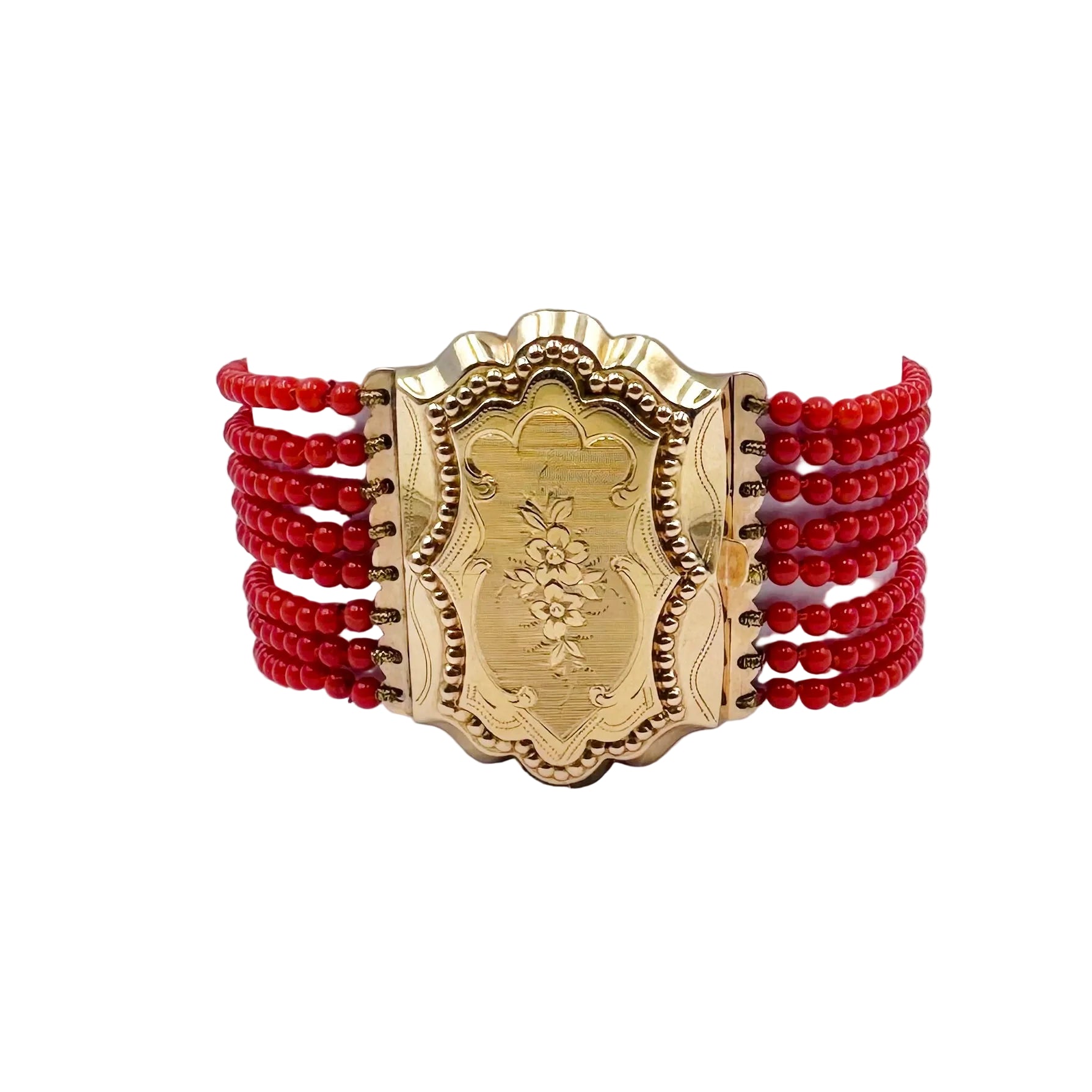 Bracelet en or jaune et perles de corail