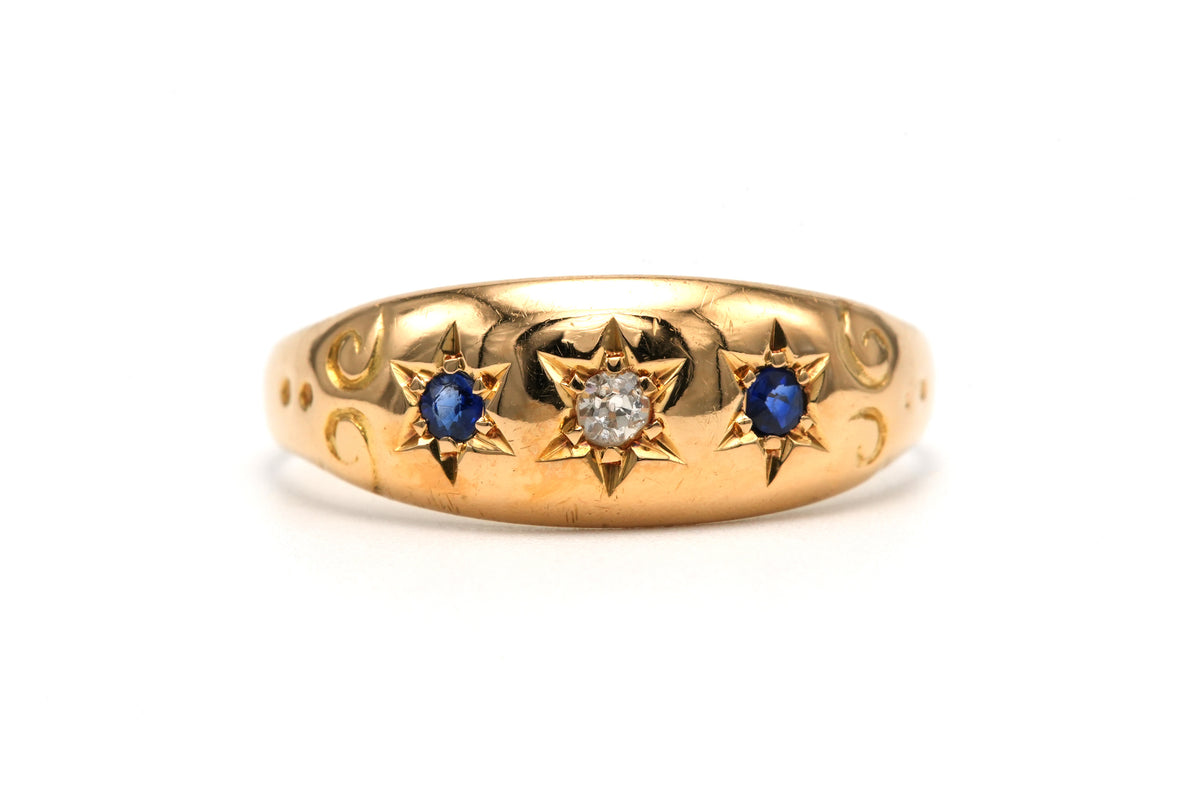 Bague en or jaune, saphirs et diamants