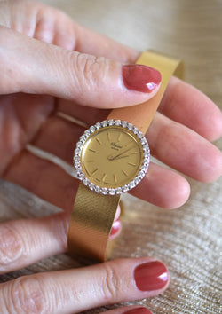Montre CHOPARD, Réf. 810, or jaune 18 carats et diamants, bracelet intégré or massif, vers 1980.