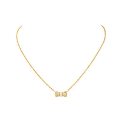Collier Pendentif VAN CLEEF & ARPELS "Noeud" en or jaune, corail et diamants