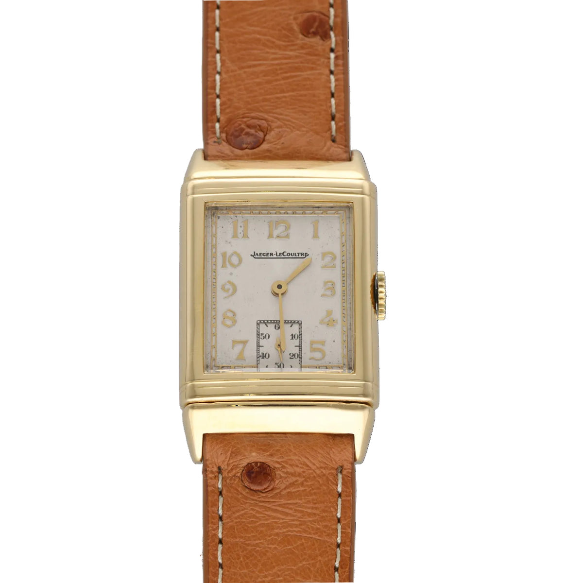 Montre JAEGER LECOULTRE "Reverso Vintage" en or blanc, or jaune et cuir