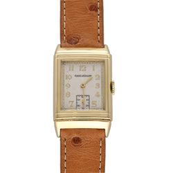 Montre JAEGER LECOULTRE "Reverso Vintage" en or blanc, or jaune et cuir