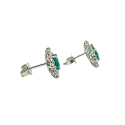 Boucles d'oreilles Puces en or blanc, émeraudes et diamants