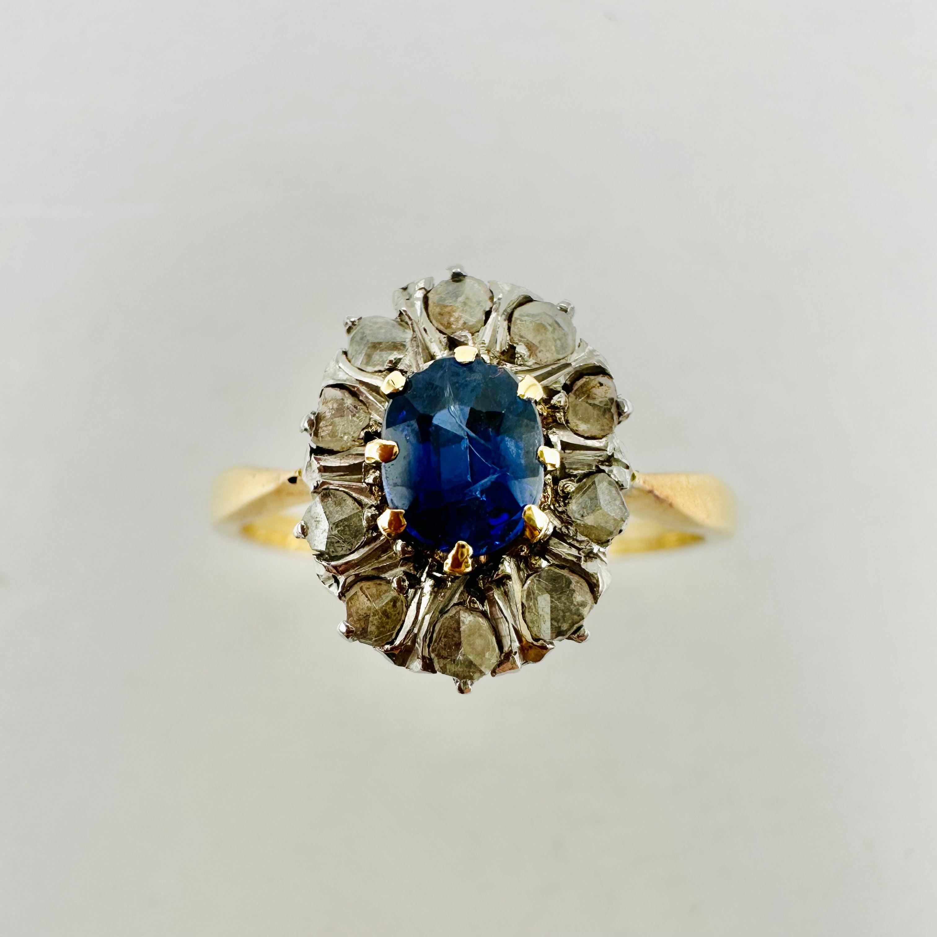 Bague Marguerite en or jaune, or blanc, saphir et diamants