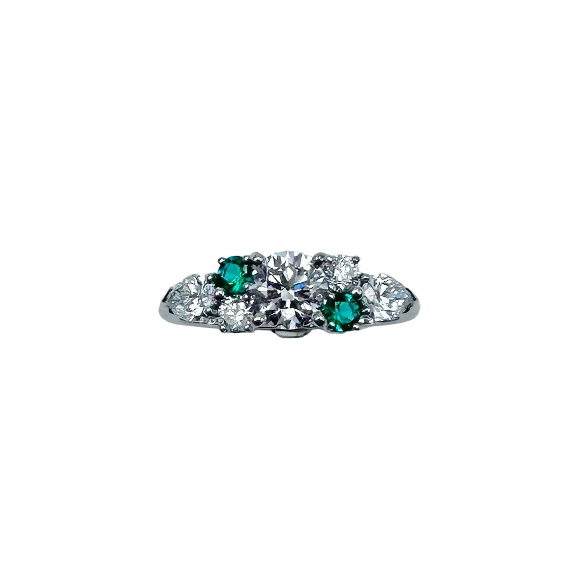 Bague Solitaire en or blanc, diamants et émeraudes