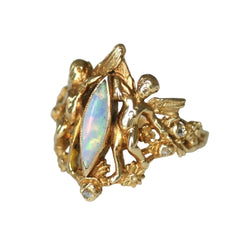 Bague en or jaune, opale et diamants