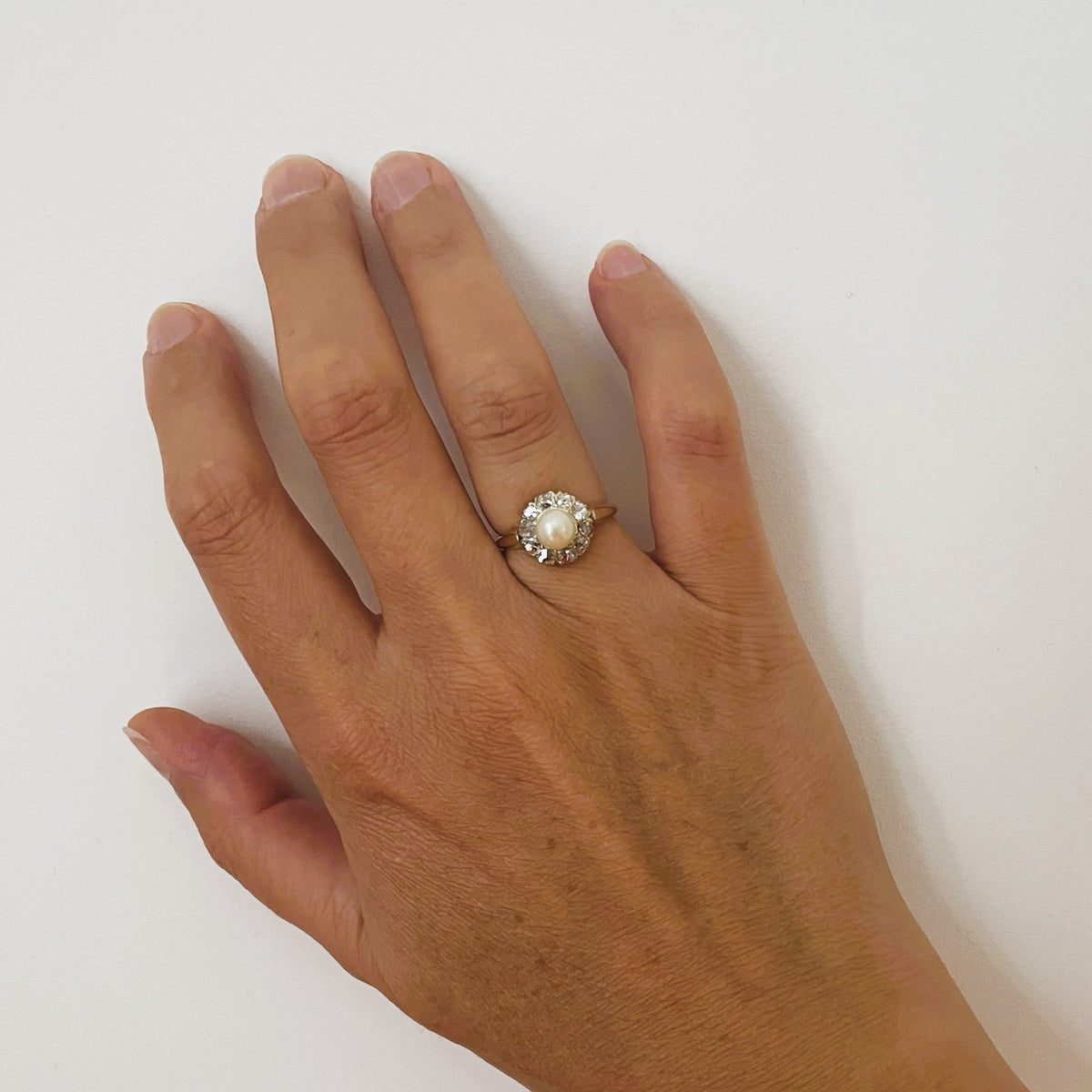 Bague Marguerite en or rose, perle et diamants