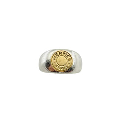 Bague Chevalière HERMÈS "Clou de selle" en argent et or jaune