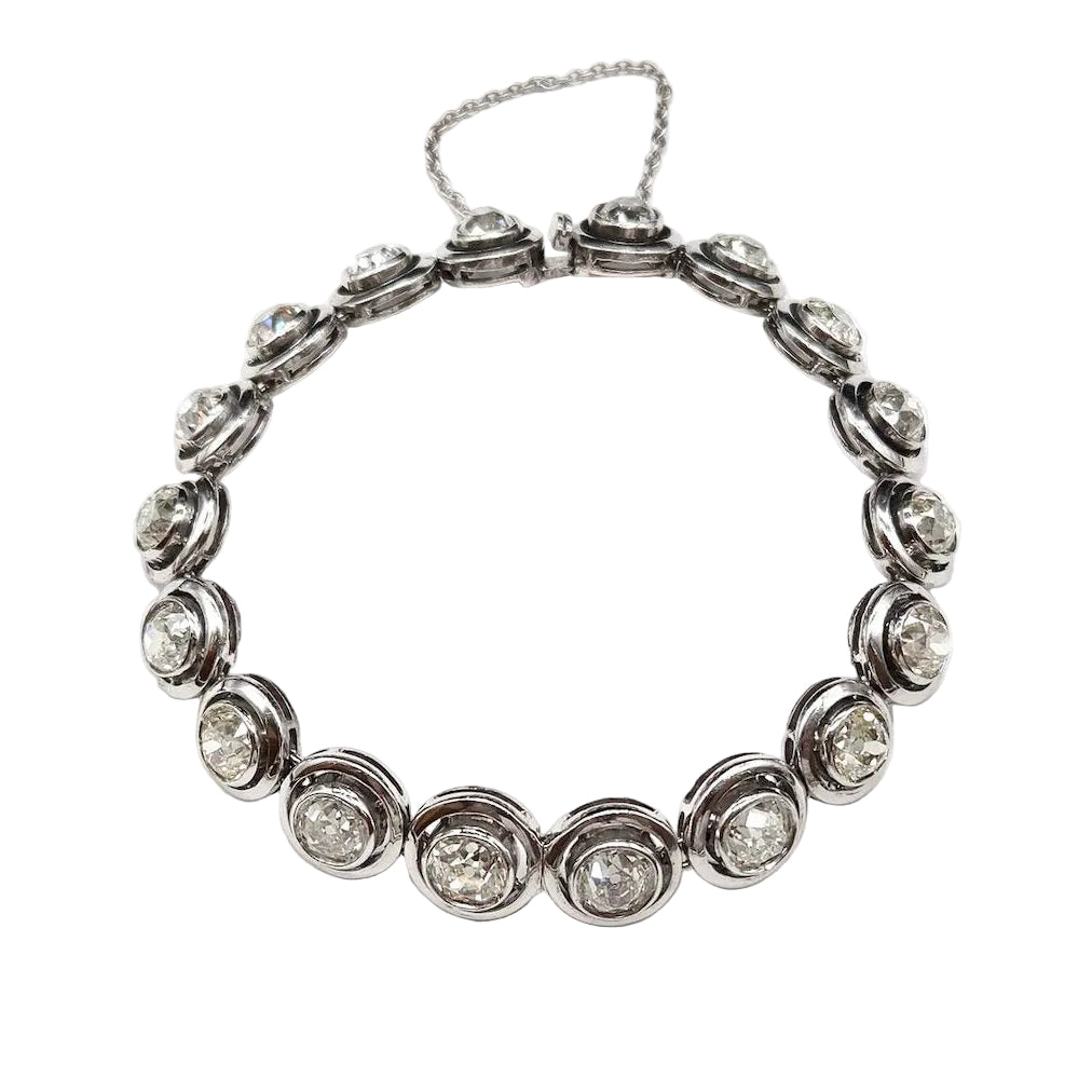Bracelet en or blanc, argent et diamants