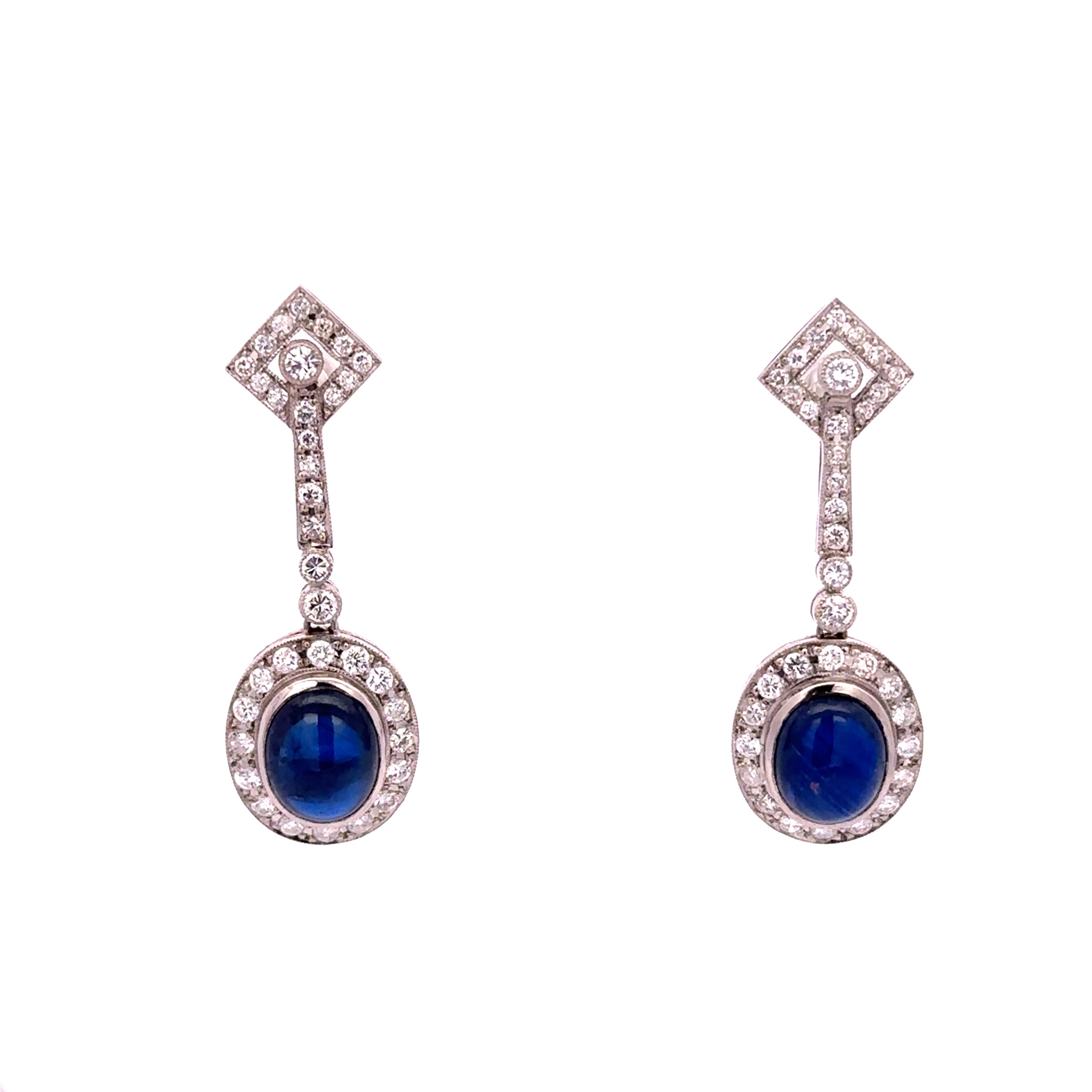 Boucles d'oreilles Pendantes en platine, saphirs et diamants
