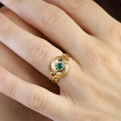 Bague en or rose et émeraude