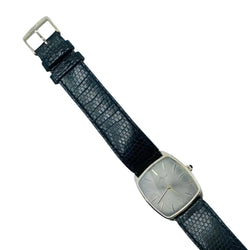 Montre BAUME & MERCIER en or jaune et cuir