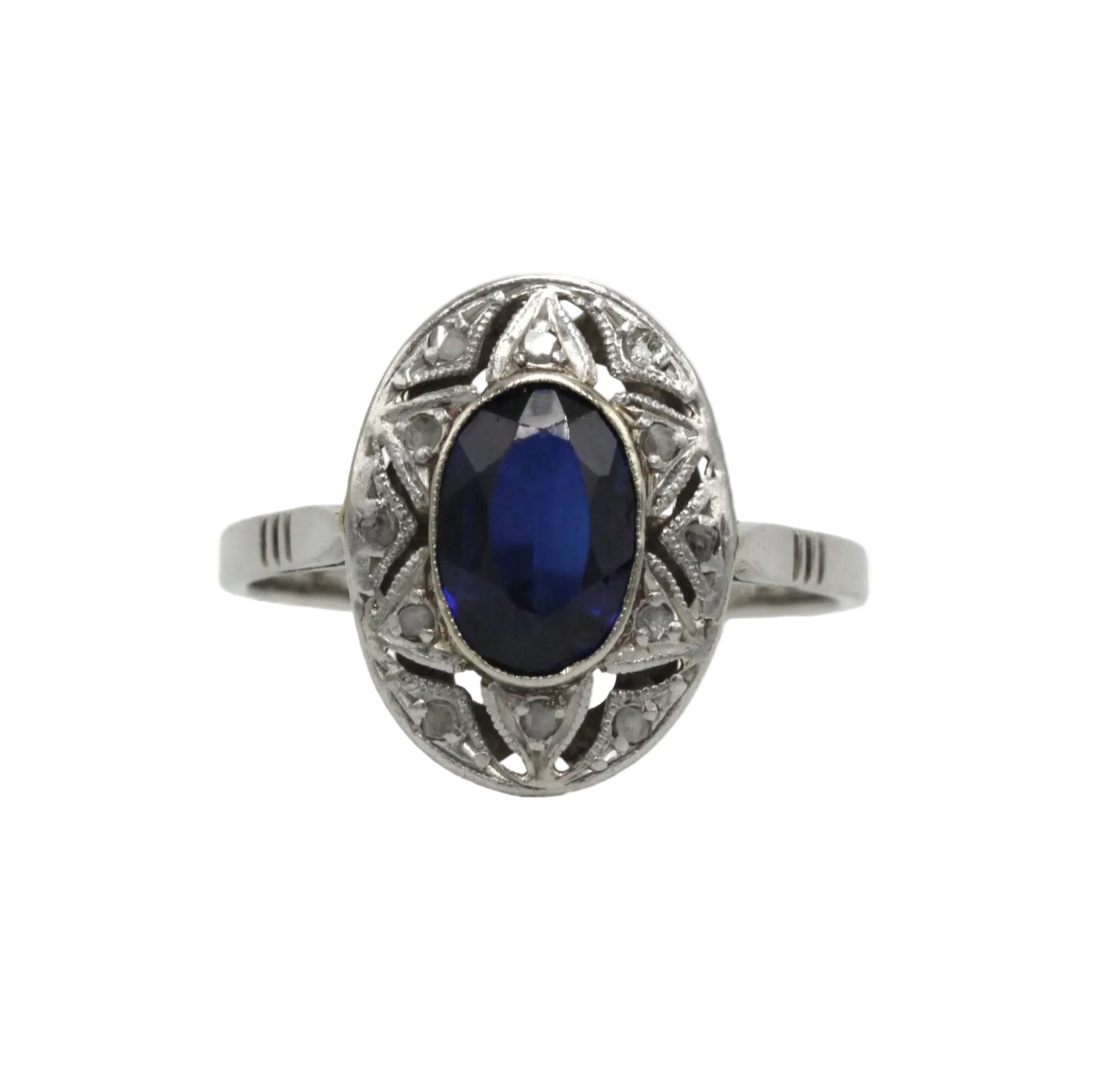 Bague Entourage en or blanc, platine, saphir et diamants