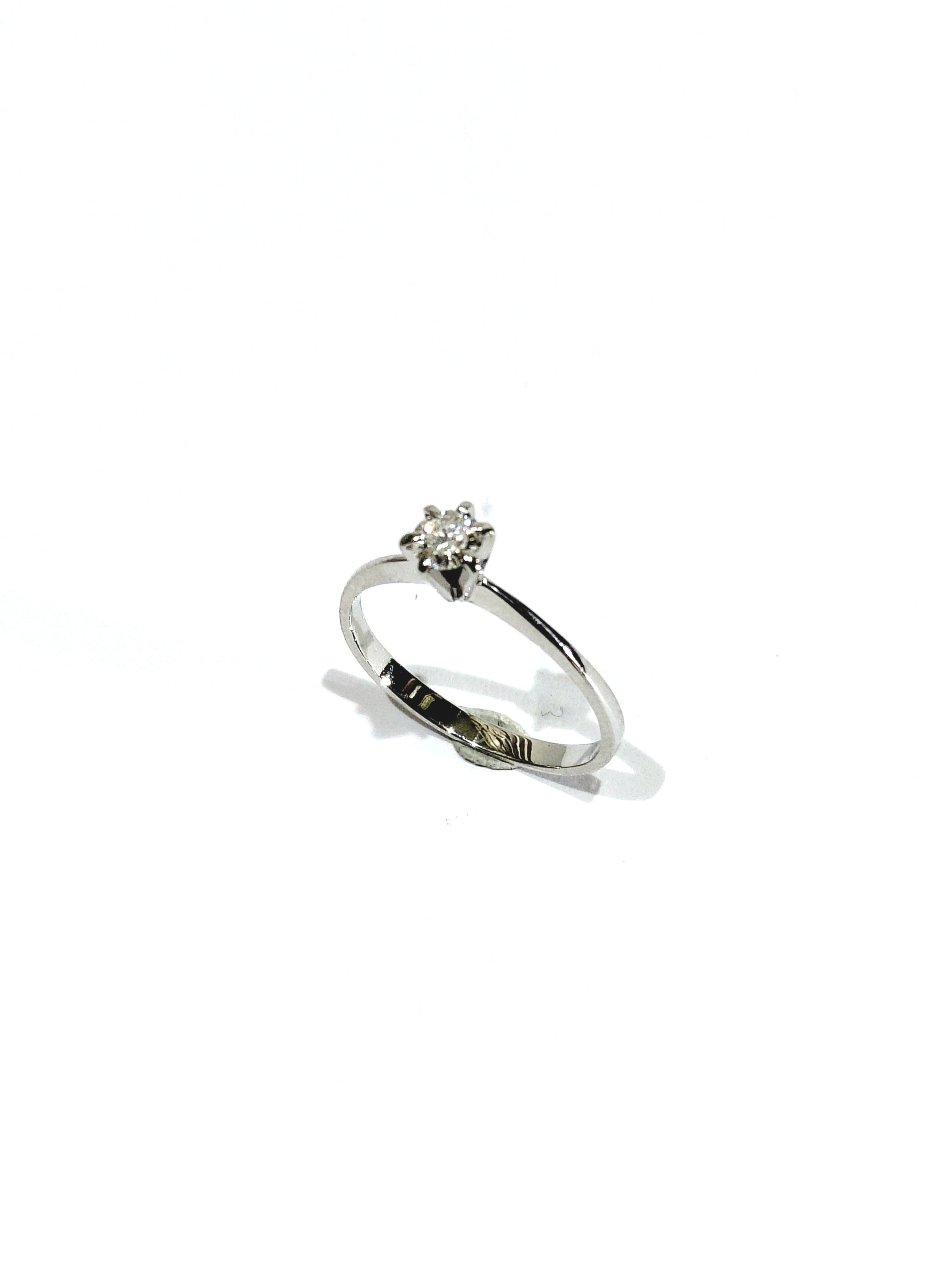 Solitaire en or blanc et diamant