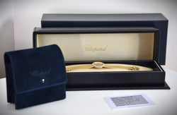 Montre CHOPARD, Réf. 810, or jaune 18 carats et diamants, bracelet intégré or massif, vers 1980.