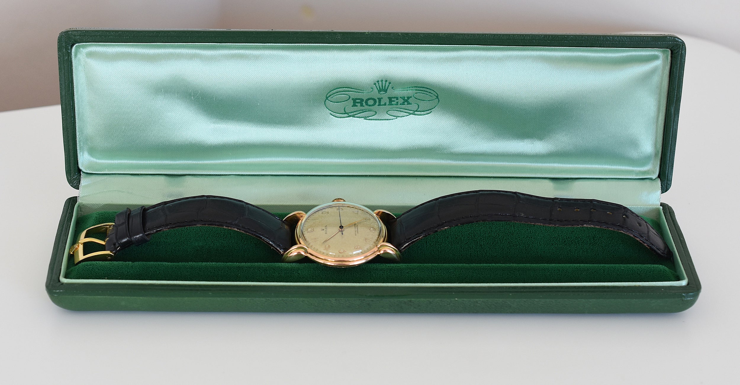 Montre ROLEX "Chronomètre" en or rose, acier et cuir