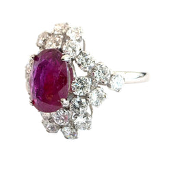 Bague Entourage en or blanc, rubis et diamants