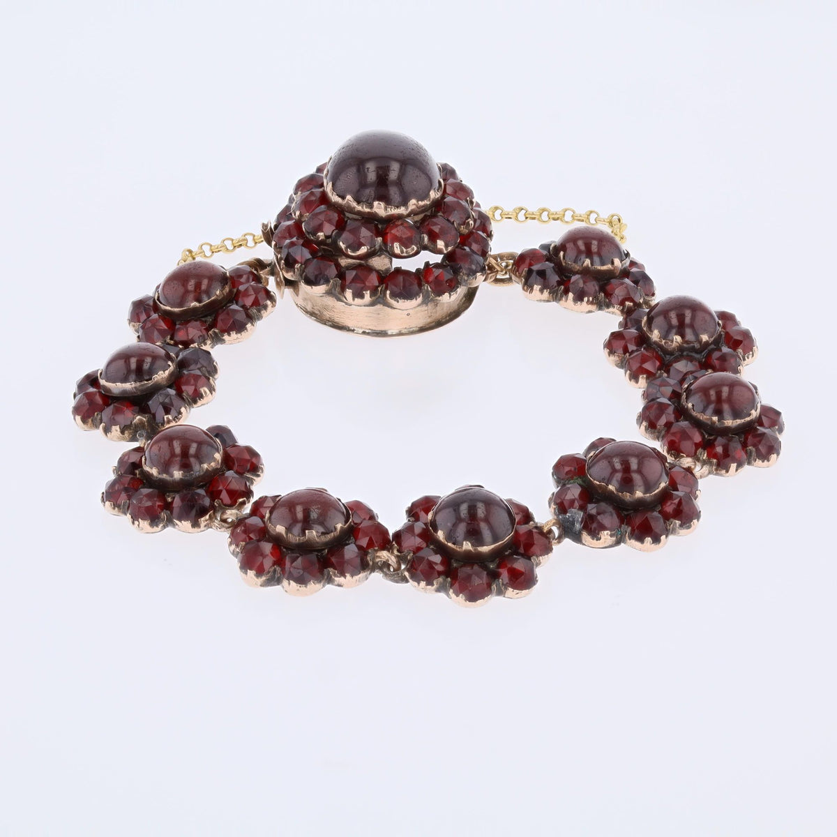 Bracelet en or jaune, argent et grenats