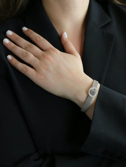 ANDRE COL Montre à secret or blanc diamants - Castafiore